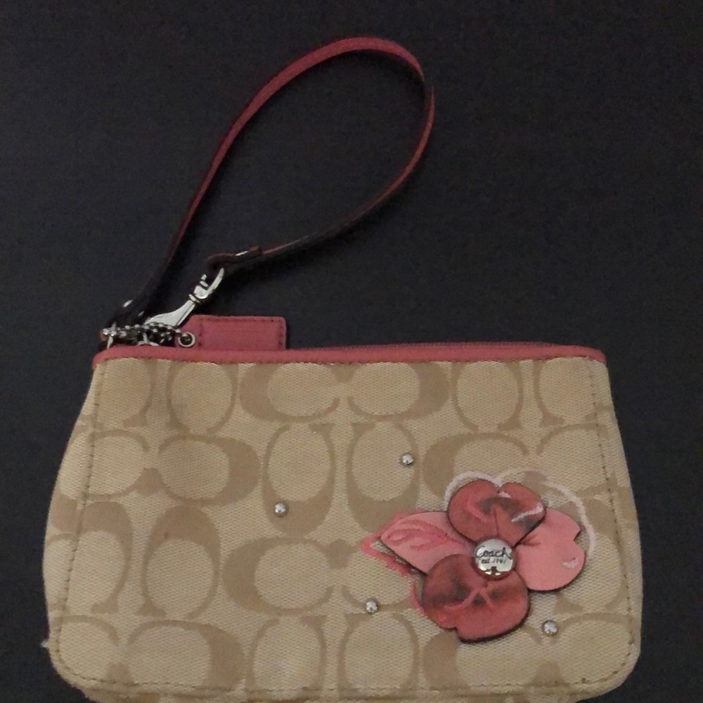 Tan and floral coach wristlet